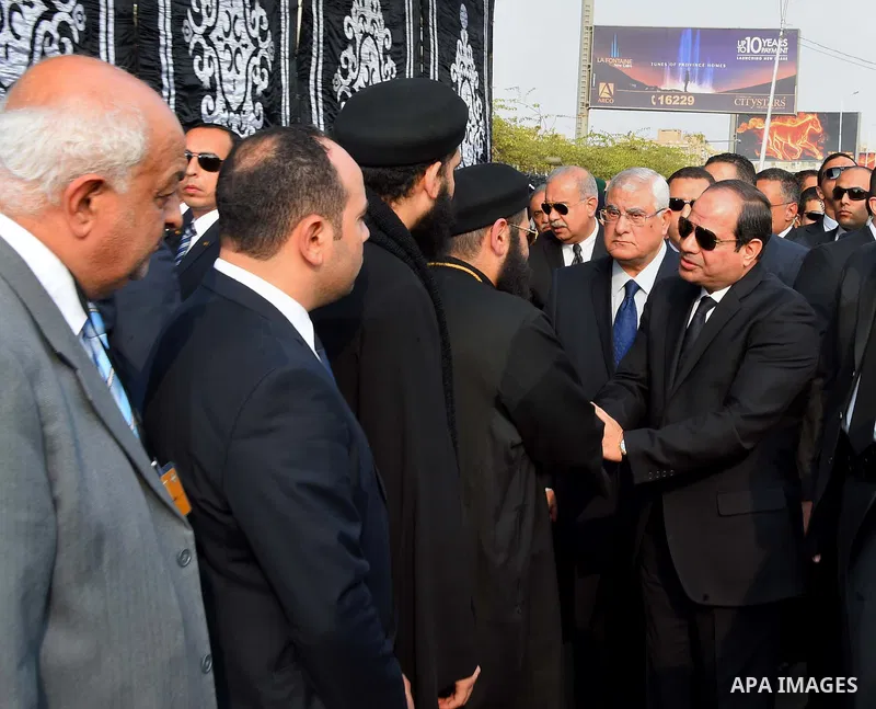 Egyptian President Abdel Fattah al-Sisi attends the funeral of the victims of a bomb explosion that targeted a Coptic Orthodox Church in Cairo, on December 12, 2016. Photo by Egyptian President Office