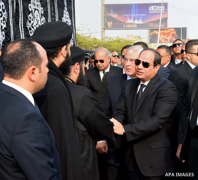 Egyptian President Abdel Fattah al-Sisi attends the funeral of the victims of a bomb explosion that targeted a Coptic Orthodox Church in Cairo, on December 12, 2016. Photo by Egyptian President Office