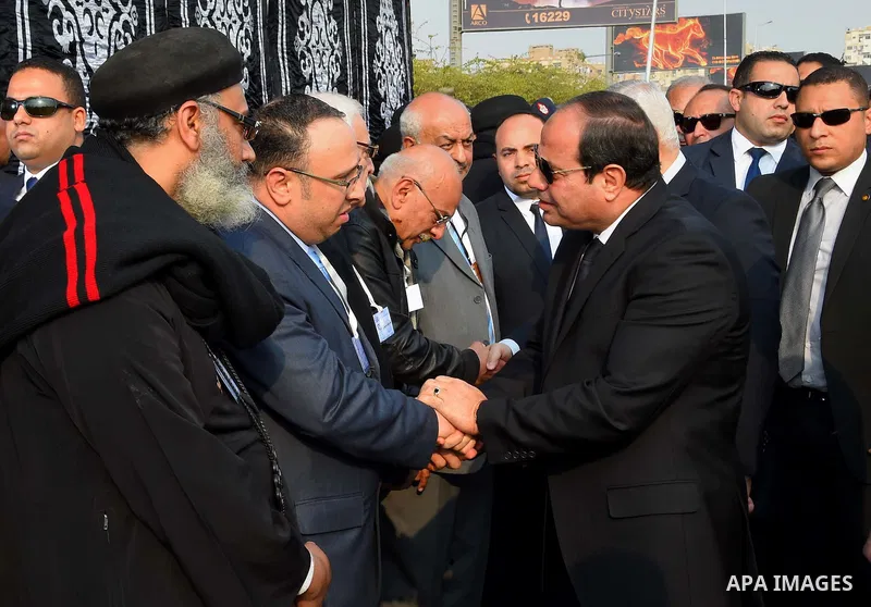 Egyptian President Abdel Fattah al-Sisi attends the funeral of the victims of a bomb explosion that targeted a Coptic Orthodox Church in Cairo, on December 12, 2016. Photo by Egyptian President Office