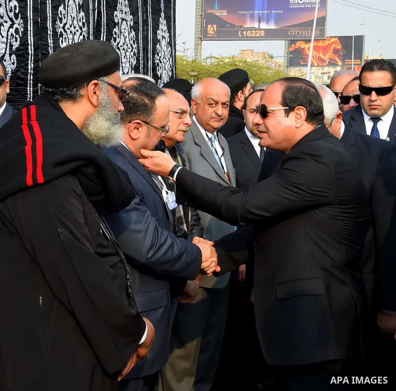 Egyptian President Abdel Fattah al-Sisi attends the funeral of the victims of a bomb explosion that targeted a Coptic Orthodox Church in Cairo, on December 12, 2016. Photo by Egyptian President Office