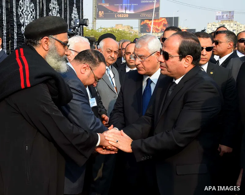 Egyptian President Abdel Fattah al-Sisi attends the funeral of the victims of a bomb explosion that targeted a Coptic Orthodox Church in Cairo, on December 12, 2016. Photo by Egyptian President Office