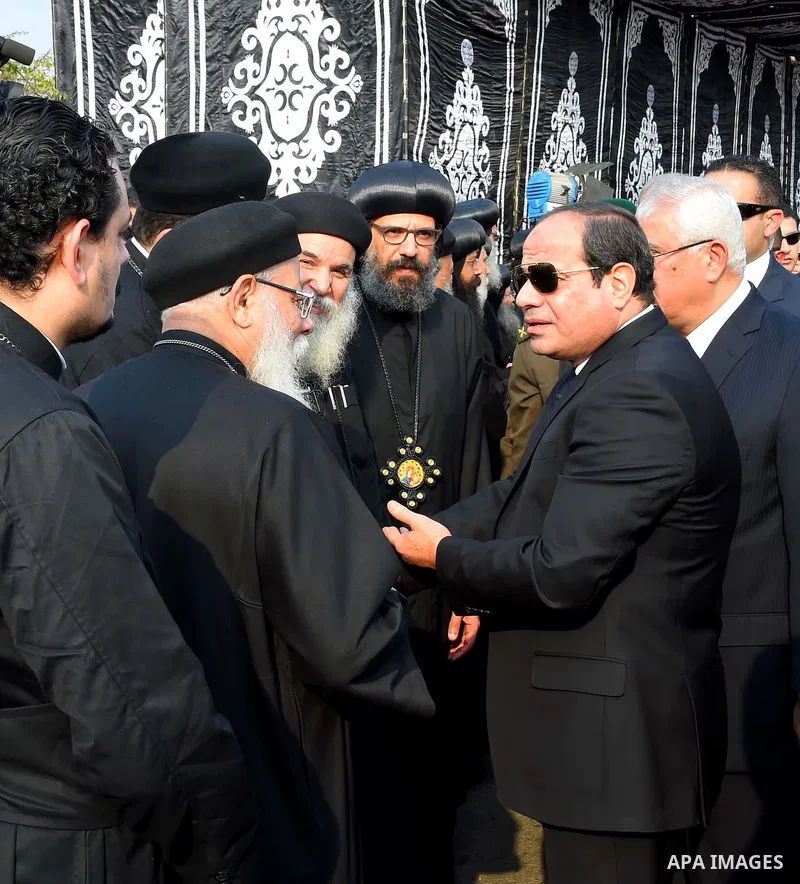Egyptian President Abdel Fattah al-Sisi attends the funeral of the victims of a bomb explosion that targeted a Coptic Orthodox Church in Cairo, on December 12, 2016. Photo by Egyptian President Office