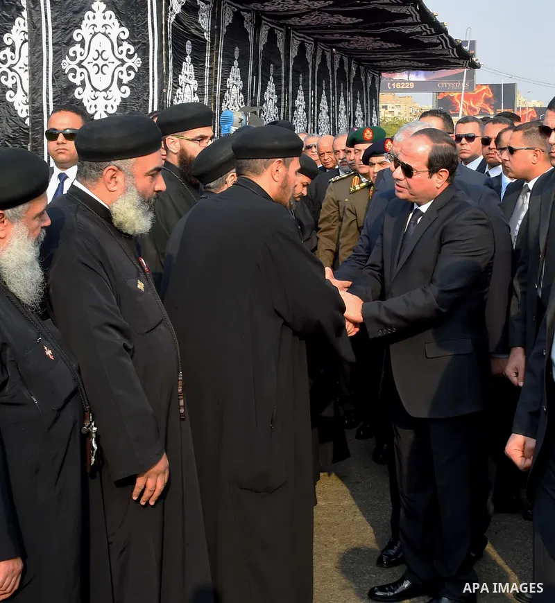Egyptian President Abdel Fattah al-Sisi attends the funeral of the victims of a bomb explosion that targeted a Coptic Orthodox Church in Cairo, on December 12, 2016. Photo by Egyptian President Office