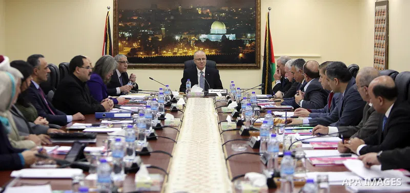 Palestinian Prime Minister, Rami Hamdallah, chairs a meeting of the council Ministers, in the West Bank city of Ramallah, on December 13, 2016. Photo by Prime Minister Office