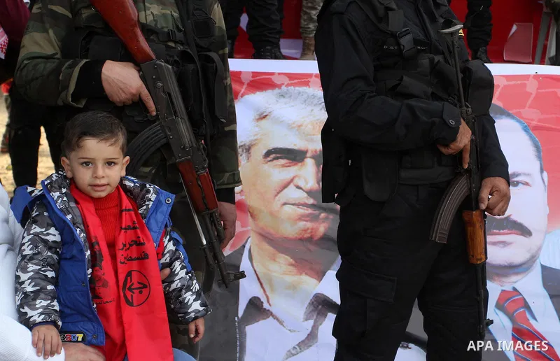 Palestinians take part in a rally marking the 49th anniversary of the founding of the Popular Front for the Liberation of Palestine (PFLP), in Rafah in the southern Gaza strip, on 13 December 2016. Photo by Abed Rahim Kh...