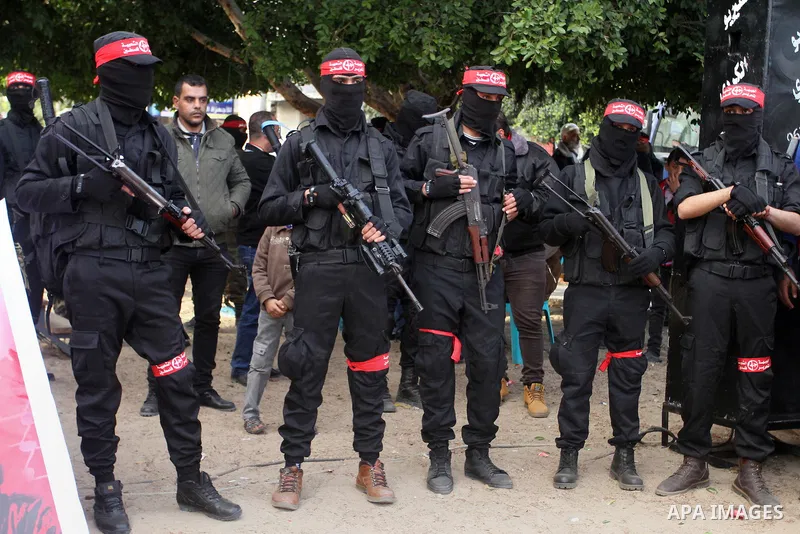 Palestinians take part in a rally marking the 49th anniversary of the founding of the Popular Front for the Liberation of Palestine (PFLP), in Rafah in the southern Gaza strip, on 13 December 2016. Photo by Abed Rahim Kh...
