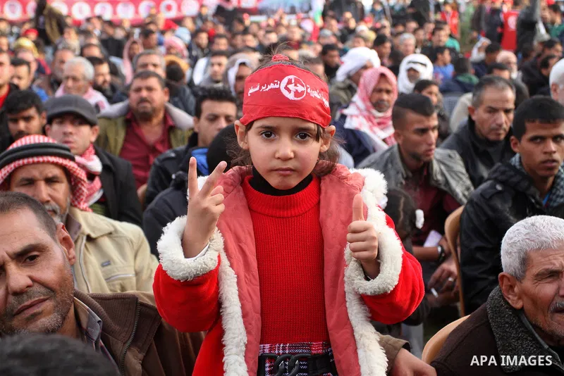 Palestinians take part in a rally marking the 49th anniversary of the founding of the Popular Front for the Liberation of Palestine (PFLP), in Rafah in the southern Gaza strip, on 13 December 2016. Photo by Abed Rahim Kh...