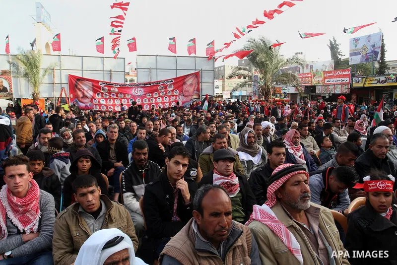 Palestinians take part in a rally marking the 49th anniversary of the founding of the Popular Front for the Liberation of Palestine (PFLP), in Rafah in the southern Gaza strip, on 13 December 2016. Photo by Abed Rahim Kh...