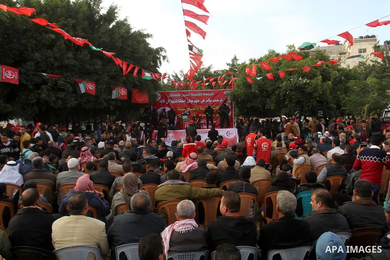 Palestinians take part in a rally marking the 49th anniversary of the founding of the Popular Front for the Liberation of Palestine (PFLP), in Rafah in the southern Gaza strip, on 13 December 2016. Photo by Abed Rahim Kh...