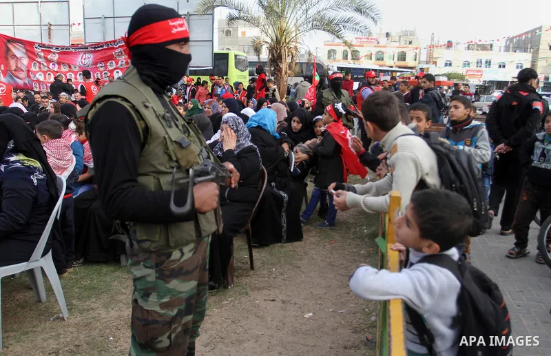 Palestinians take part in a rally marking the 49th anniversary of the founding of the Popular Front for the Liberation of Palestine (PFLP), in Rafah in the southern Gaza strip, on 13 December 2016. Photo by Abed Rahim Kh...