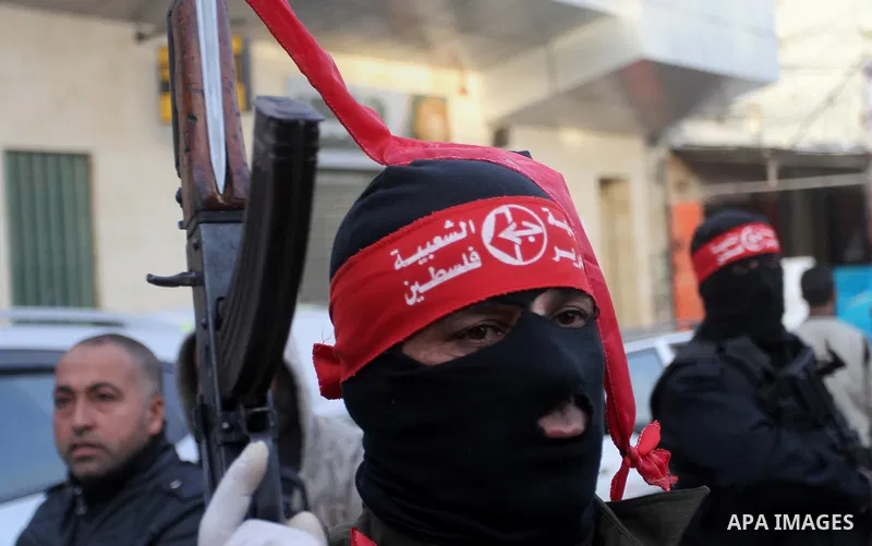 Palestinians take part in a rally marking the 49th anniversary of the founding of the Popular Front for the Liberation of Palestine (PFLP), in Rafah in the southern Gaza strip, on 13 December 2016. Photo by Abed Rahim Kh...