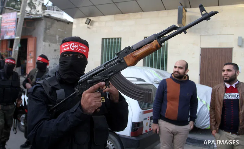 Palestinians take part in a rally marking the 49th anniversary of the founding of the Popular Front for the Liberation of Palestine (PFLP), in Rafah in the southern Gaza strip, on 13 December 2016. Photo by Abed Rahim Kh...