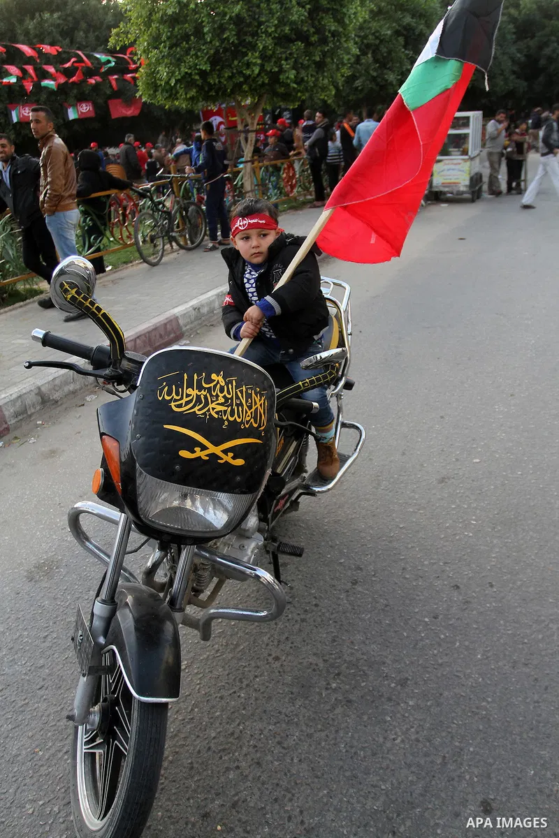 Palestinians take part in a rally marking the 49th anniversary of the founding of the Popular Front for the Liberation of Palestine (PFLP), in Rafah in the southern Gaza strip, on 13 December 2016. Photo by Abed Rahim Kh...