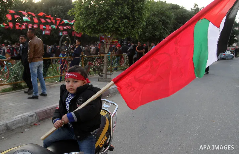 Palestinians take part in a rally marking the 49th anniversary of the founding of the Popular Front for the Liberation of Palestine (PFLP), in Rafah in the southern Gaza strip, on 13 December 2016. Photo by Abed Rahim Kh...