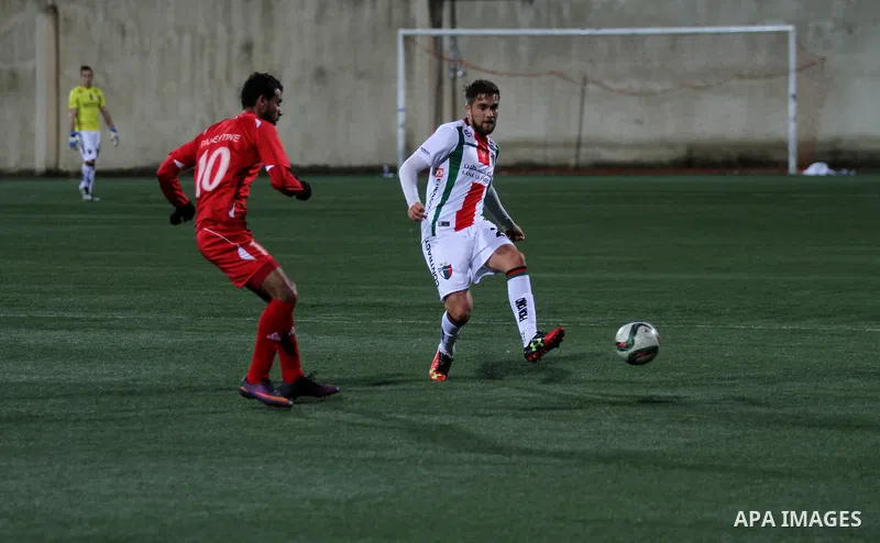 Palestino players and Chile players compete during their friendly soccer match between Palestine and CD Palestino at Nablus Stadium in The West Bank City of Nablus, 13 December 2016. CD Palestino visit West Bank and Gaza...