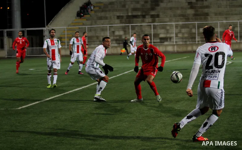 Palestino players and Chile players compete during their friendly soccer match between Palestine and CD Palestino at Nablus Stadium in The West Bank City of Nablus, 13 December 2016. CD Palestino visit West Bank and Gaza...