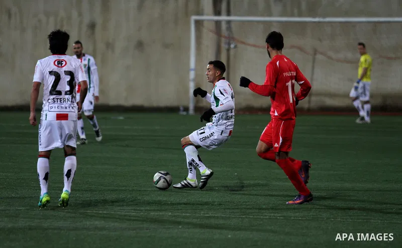 Palestino players and Chile players compete during their friendly soccer match between Palestine and CD Palestino at Nablus Stadium in The West Bank City of Nablus, 13 December 2016. CD Palestino visit West Bank and Gaza...