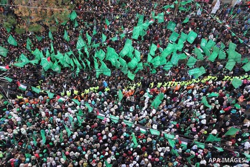 Palestinian Hamas supporters shout slogans during a rally marking the 29th anniversary of the founding of the Hamas movement, in Gaza city December 14, 2016. Photo by Ashraf Amra