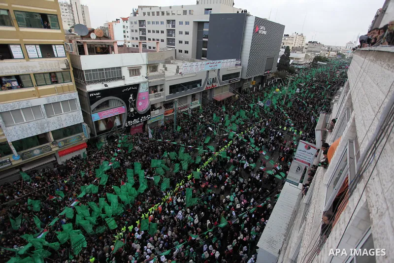Palestinian Hamas supporters shout slogans during a rally marking the 29th anniversary of the founding of the Hamas movement, in Gaza city December 14, 2016. Photo by Ashraf Amra