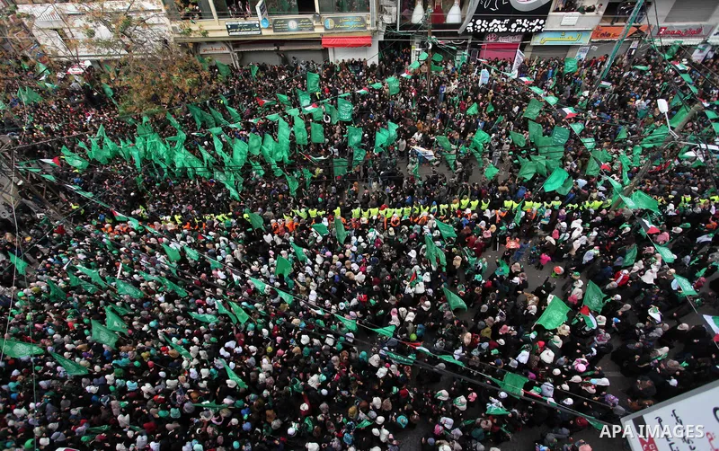 Palestinian Hamas supporters shout slogans during a rally marking the 29th anniversary of the founding of the Hamas movement, in Gaza city December 14, 2016. Photo by Ashraf Amra