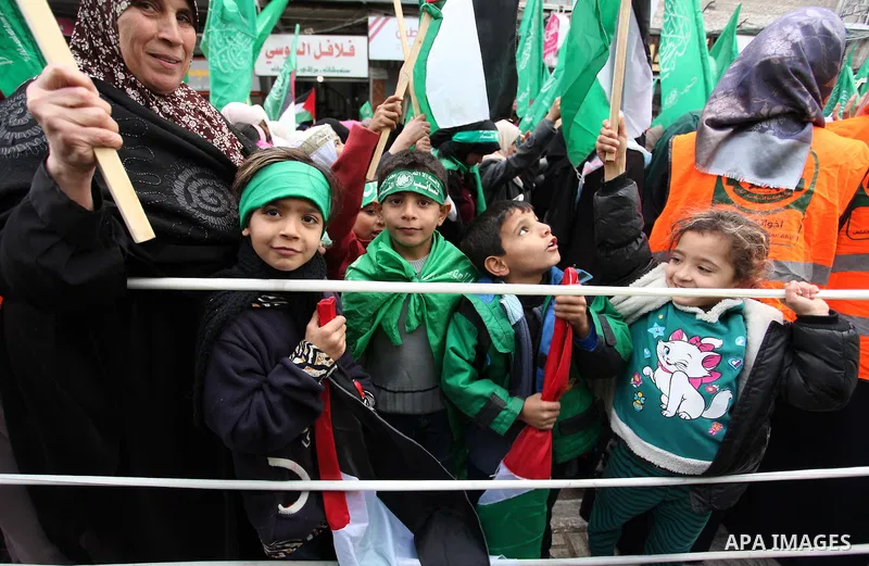Palestinian Hamas supporters shout slogans during a rally marking the 29th anniversary of the founding of the Hamas movement, in Gaza city December 14, 2016. Photo by Ashraf Amra