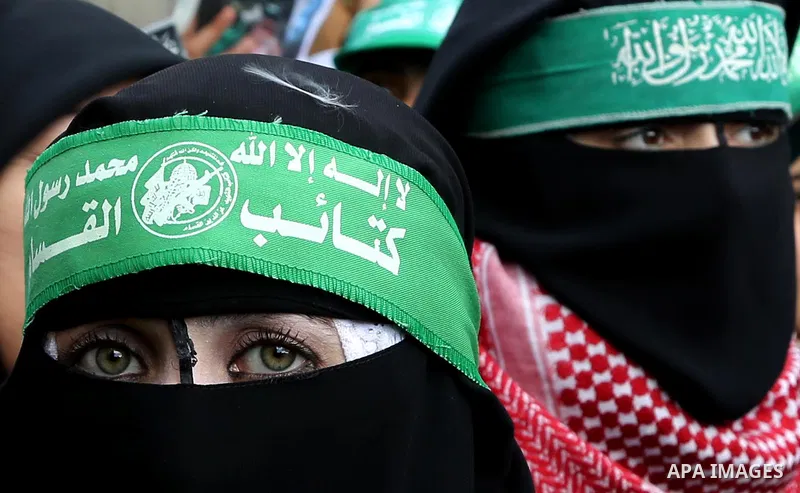 Palestinian Hamas supporters shout slogans during a rally marking the 29th anniversary of the founding of the Hamas movement, in Gaza city December 14, 2016. Photo by Ashraf Amra