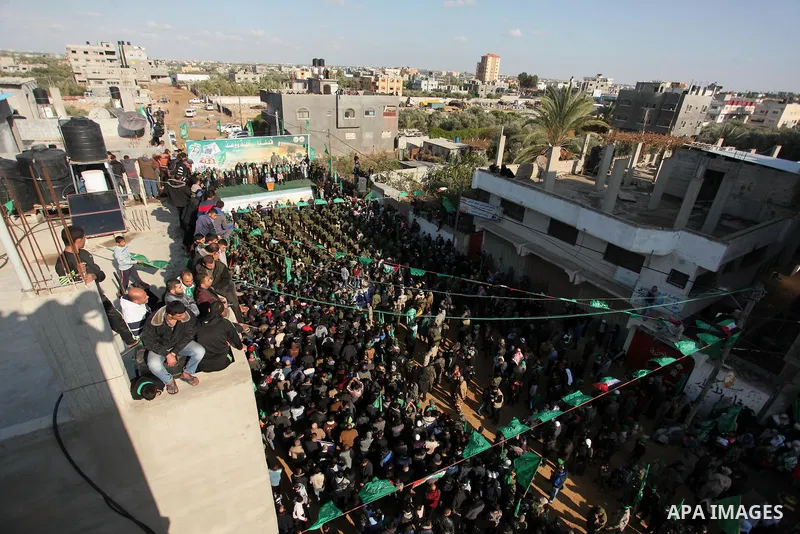 Palestinian Hamas supporters take part during a rally marking the 29th anniversary of the founding of the Hamas movement, in Nuseirat refugee camp in the central Gaza Strip, December 16, 2016. . Photo by Ashraf Amra