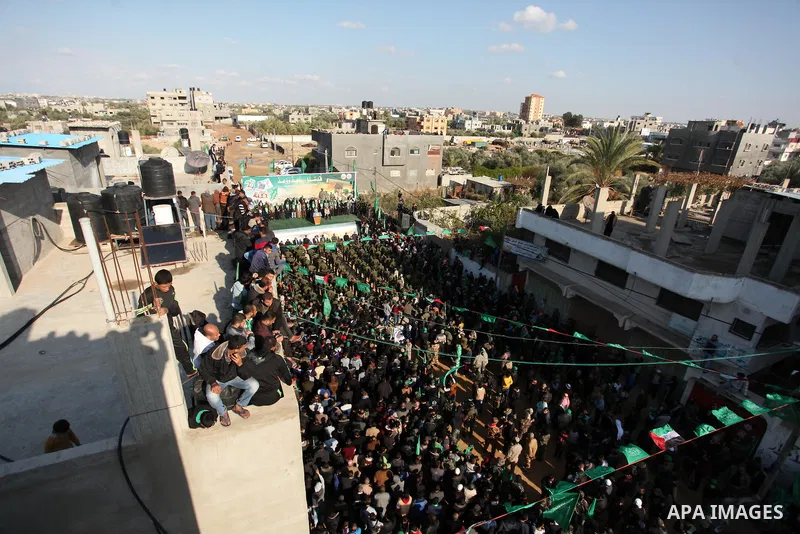 Palestinian Hamas supporters take part during a rally marking the 29th anniversary of the founding of the Hamas movement, in Nuseirat refugee camp in the central Gaza Strip, December 16, 2016. . Photo by Ashraf Amra