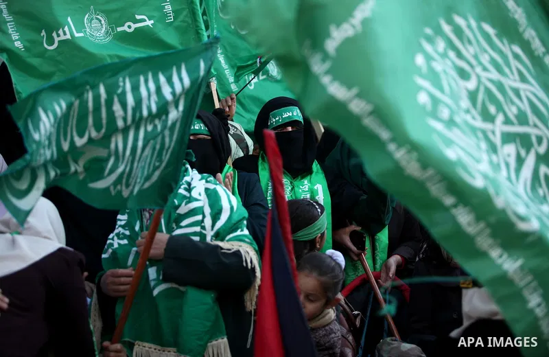 Palestinian Hamas supporters take part during a rally marking the 29th anniversary of the founding of the Hamas movement, in Nuseirat refugee camp in the central Gaza Strip, December 16, 2016. . Photo by Ashraf Amra