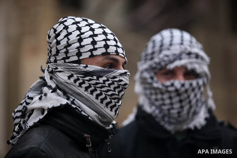 Palestinian protesters clash with Israeli security forces following a demonstration against the expropriation of Palestinian land by Israel in the village of Kfar Qaddum, near Nablus, in the occupied West Bank on Decembe...