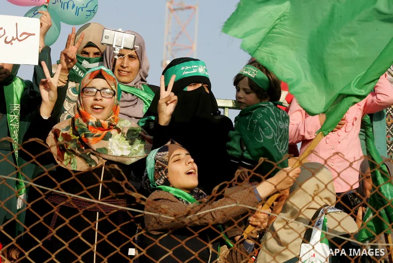Palestinians take part in a rally marking the 29th anniversary of the founding of the Hamas movement, in Rafah in the southern Gaza Strip December 16, 2016. Photo by Abed Rahim Khatib