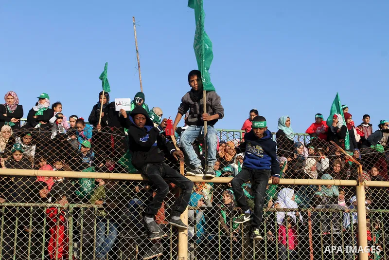 Palestinians take part in a rally marking the 29th anniversary of the founding of the Hamas movement, in Rafah in the southern Gaza Strip December 16, 2016. Photo by Abed Rahim Khatib