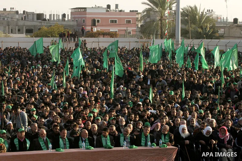 Palestinians take part in a rally marking the 29th anniversary of the founding of the Hamas movement, in Rafah in the southern Gaza Strip December 16, 2016. Photo by Abed Rahim Khatib