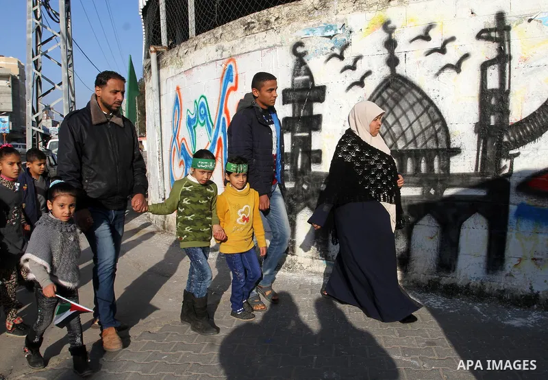 Palestinians take part in a rally marking the 29th anniversary of the founding of the Hamas movement, in Rafah in the southern Gaza Strip December 16, 2016. Photo by Abed Rahim Khatib