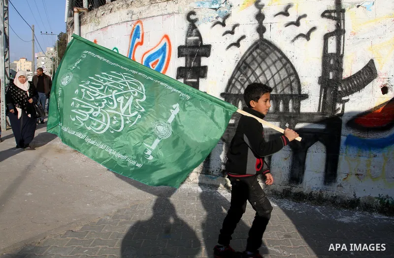 Palestinians take part in a rally marking the 29th anniversary of the founding of the Hamas movement, in Rafah in the southern Gaza Strip December 16, 2016. Photo by Abed Rahim Khatib