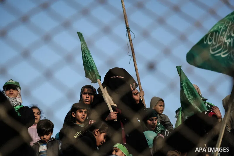 Palestinians take part in a rally marking the 29th anniversary of the founding of the Hamas movement, in Rafah in the southern Gaza Strip December 16, 2016. Photo by Mohammed Dahman