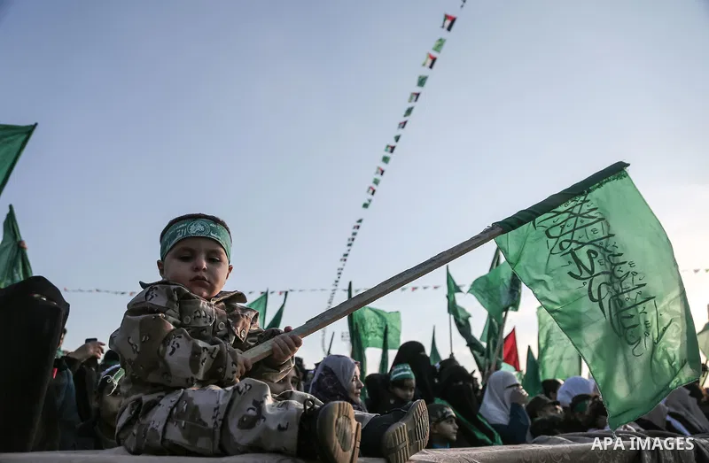 Palestinians take part in a rally marking the 29th anniversary of the founding of the Hamas movement, in Rafah in the southern Gaza Strip December 16, 2016. Photo by Mohammed Dahman
