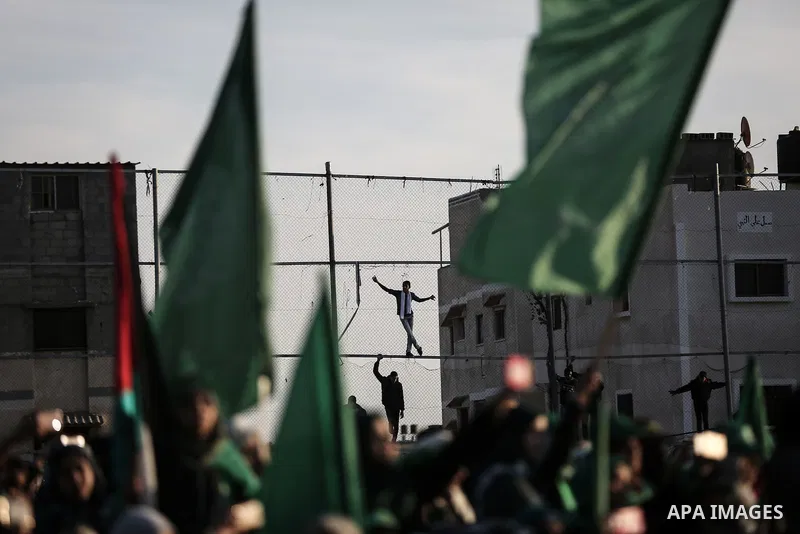 Palestinians take part in a rally marking the 29th anniversary of the founding of the Hamas movement, in Rafah in the southern Gaza Strip December 16, 2016. Photo by Mohammed Dahman