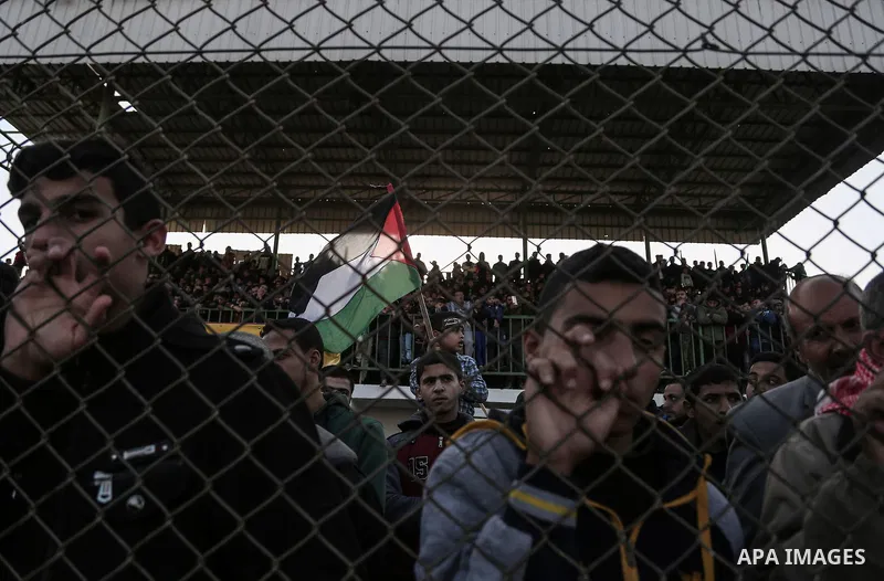 Palestinians take part in a rally marking the 29th anniversary of the founding of the Hamas movement, in Rafah in the southern Gaza Strip December 16, 2016. Photo by Mohammed Dahman