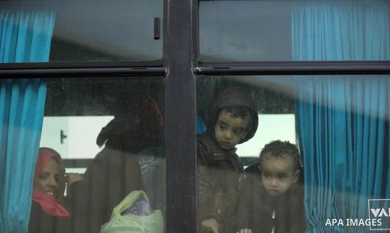 Palestinians wait for travel permits to cross into Egypt through the Rafah border crossing after it was opened by Egyptian authorities for humanitarian cases, in Rafah in the southern Gaza Strip December 17, 2016. Photo...