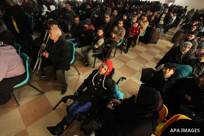 Palestinians wait for travel permits to cross into Egypt through the Rafah border crossing after it was opened by Egyptian authorities for humanitarian cases, in Rafah in the southern Gaza Strip December 17, 2016. Photo...