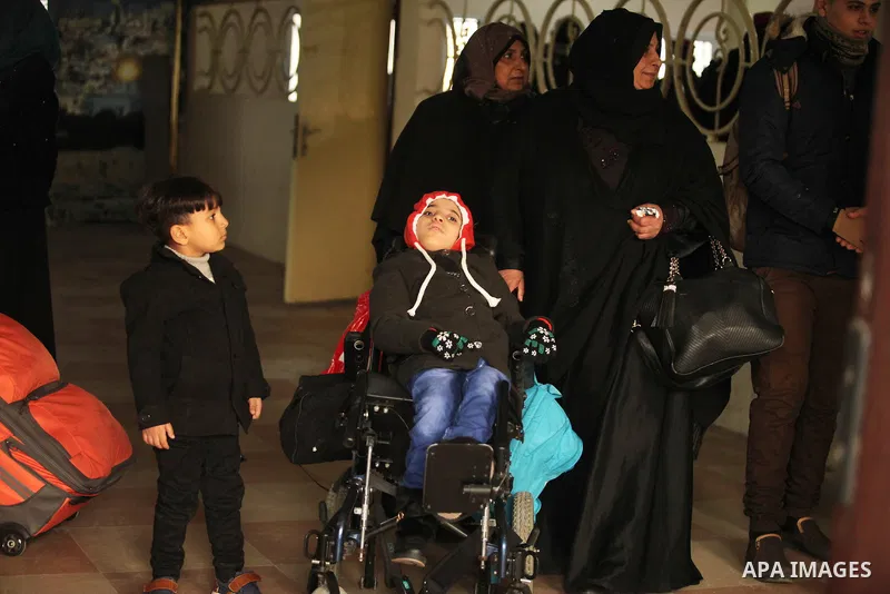 Palestinians wait for travel permits to cross into Egypt through the Rafah border crossing after it was opened by Egyptian authorities for humanitarian cases, in Rafah in the southern Gaza Strip December 17, 2016. Photo...