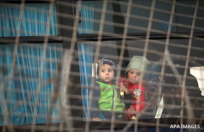 Palestinians wait for travel permits to cross into Egypt through the Rafah border crossing after it was opened by Egyptian authorities for humanitarian cases, in Rafah in the southern Gaza Strip December 17, 2016. Photo...