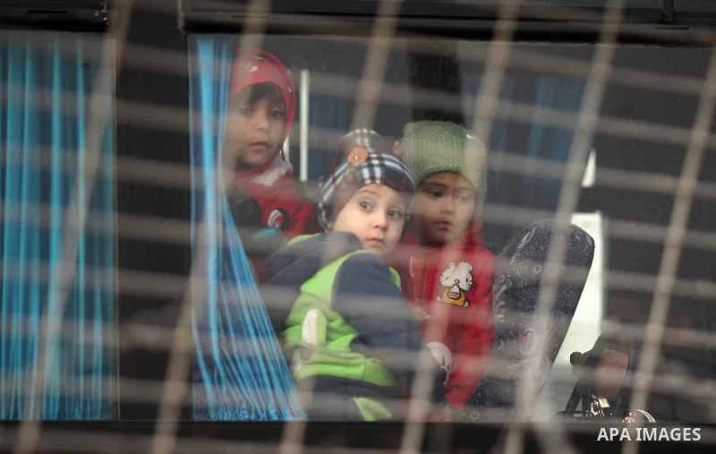 Palestinians wait for travel permits to cross into Egypt through the Rafah border crossing after it was opened by Egyptian authorities for humanitarian cases, in Rafah in the southern Gaza Strip December 17, 2016. Photo...