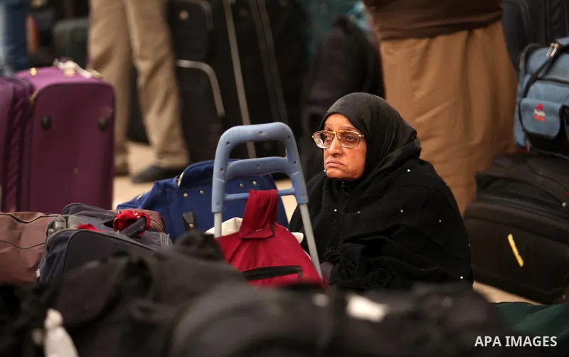 Palestinians wait for travel permits to cross into Egypt through the Rafah border crossing after it was opened by Egyptian authorities for humanitarian cases, in Rafah in the southern Gaza Strip December 17, 2016. Photo...