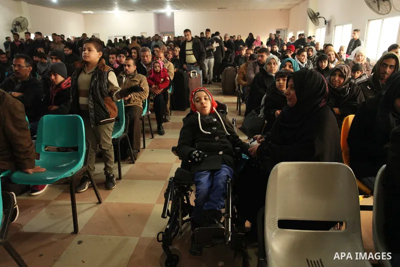 Palestinians wait for travel permits to cross into Egypt through the Rafah border crossing after it was opened by Egyptian authorities for humanitarian cases, in Rafah in the southern Gaza Strip December 17, 2016. Photo...