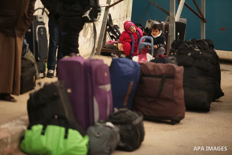 Palestinians wait for travel permits to cross into Egypt through the Rafah border crossing after it was opened by Egyptian authorities for humanitarian cases, in Rafah in the southern Gaza Strip December 17, 2016. Photo...