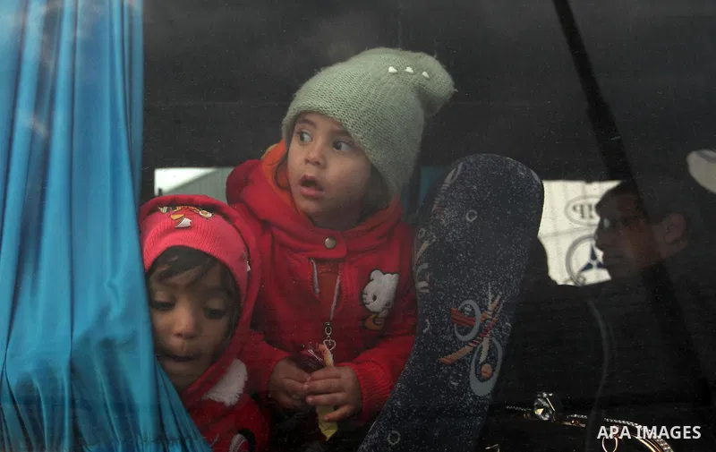 Palestinians wait for travel permits to cross into Egypt through the Rafah border crossing after it was opened by Egyptian authorities for humanitarian cases, in Rafah in the southern Gaza Strip December 17, 2016. Photo...