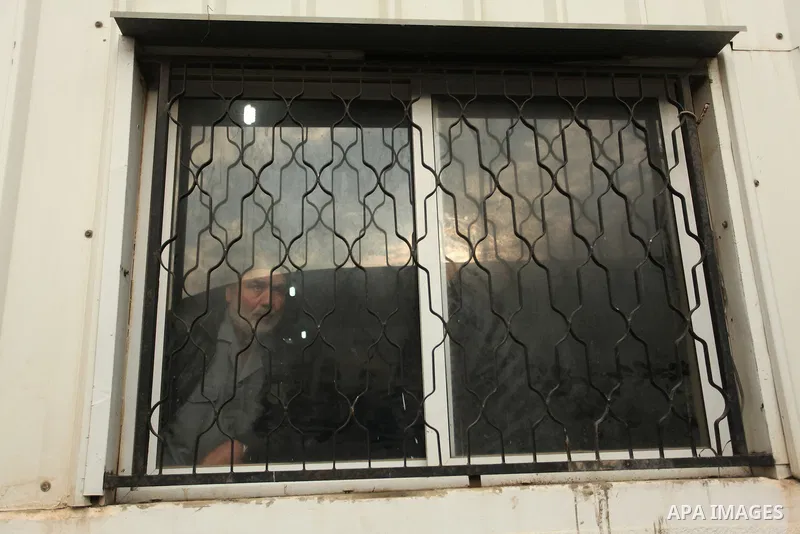 Palestinians wait for travel permits to cross into Egypt through the Rafah border crossing after it was opened by Egyptian authorities for humanitarian cases, in Rafah in the southern Gaza Strip December 17, 2016. Photo...