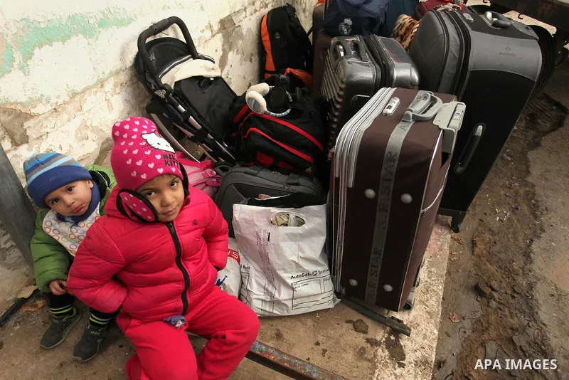 Palestinians wait for travel permits to cross into Egypt through the Rafah border crossing after it was opened by Egyptian authorities for humanitarian cases, in Rafah in the southern Gaza Strip December 17, 2016. Photo...